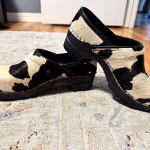 Sanita Black and Cream Cow Pattern Clogs